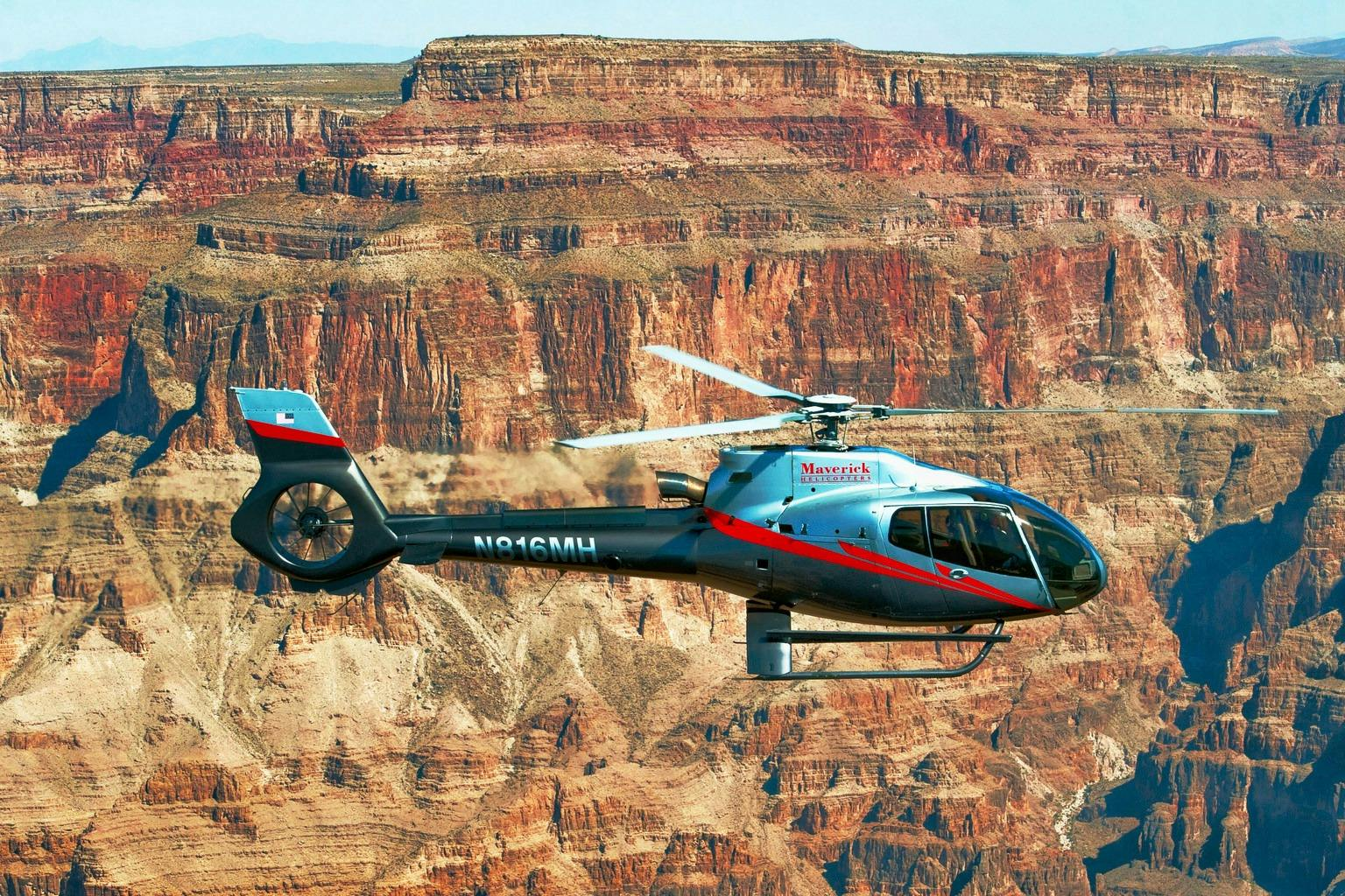 Grand Canyon: Day or Sunset Helicopter Flight with Landing + Snack & Champagne - Photo 1 of 8